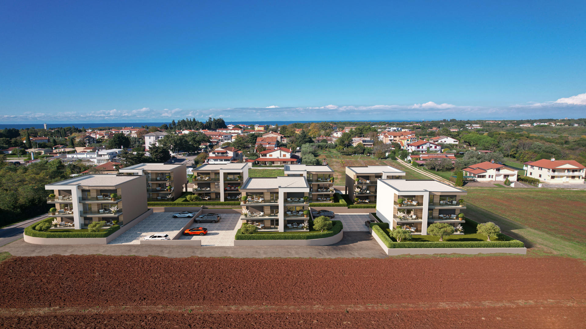 Stambeno naselje uklopljeno u fotografiju snimljenu dronom.